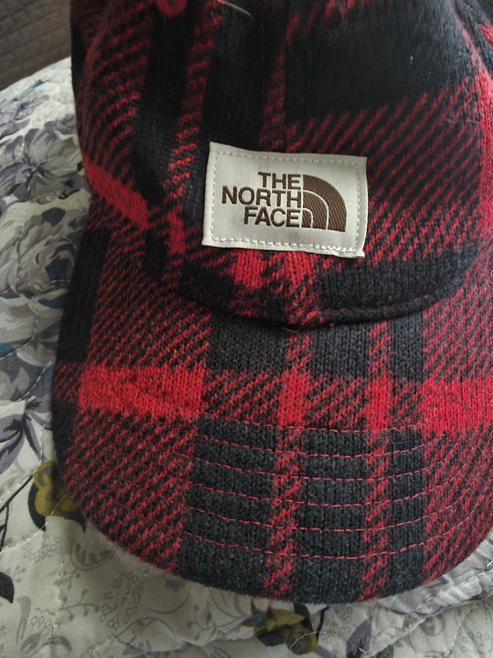 The North Face Red and Black Plaid Cap